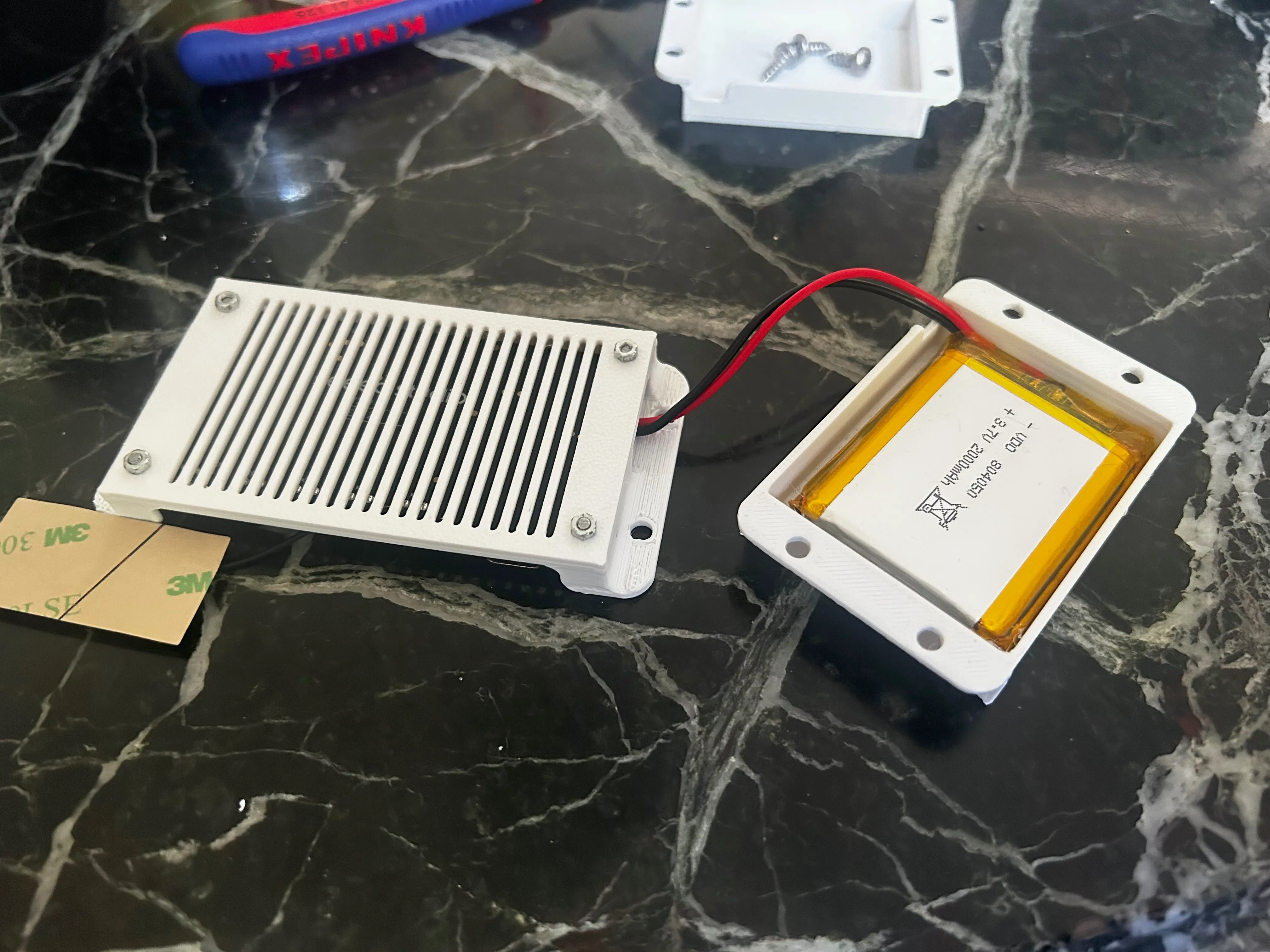 Battery and controller board holders